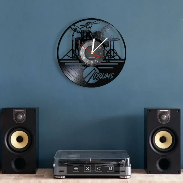 Drummers Personalized Drum Wall Clock Music Instrument Drum Kit Wall Decor Vinyl Record Wall Clock Music Lover Drummers Gift 4 Wall clock with drum set design above a turntable and speakers on a blue wall background.