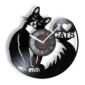 Wall clock with a black silhouette of a cat and the words "I ♥ CATS." The clock face is in the center of the cat's body.