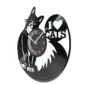 A decorative wall clock shaped like a black vinyl record features a cat design and the words "I ♥ CATS." The clock's hands are red and gold, with a black and white color scheme overall.