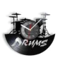 A wall clock designed like a vinyl record features drum silhouettes. The word "Drums" is printed in bold white letters.