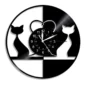 A round wall clock with black and white cat silhouettes and a heart in the center.