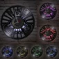 A wall clock with guitar designs and the word "ROCK," shown in six different LED backlight colors: purple, red, blue, white, green, and yellow, mounted on a textured background.