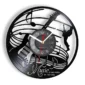 A wall clock features a guitar, musical notes, and the phrase "Music is the voice of the soul.