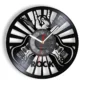 Black and white wall clock featuring guitars, a hand making a rock gesture, and the word "ROCK" at the bottom.