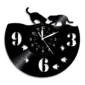 Black wall clock with vinyl record design, featuring cut-out numbers and playful silhouettes of a cat and a dog at the top.