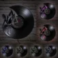 Vinyl record wall clock with guitar cutout, displayed in six different colored LED light variations against a brick wall.