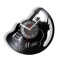 Wall clock design featuring a guitar shape and a silhouette of a singer. The word "Music" is engraved on the clock's surface.