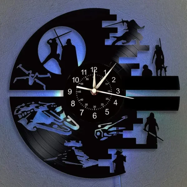 Science Fiction Movie Theme Clock Vinyl Record Wall Clock LED Night Light Home Decoration 7 Color Nightlight Wall Clock Boy Gift 2 A wall clock with silhouettes of sci-fi characters and scenes, set against a glowing blue background. The clock hands point at various times.