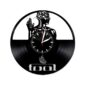 Introducing the Skeletal Brain Wall Clock: a unique timepiece featuring a vinyl record design with the silhouette of a person displaying a raised hand and visible brain, complemented by the word "tool" beneath and striking red clock hands.