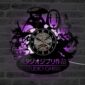 Wall clock featuring Studio Ghibli characters with purple LED backlight and Japanese text, mounted on a dark brick wall.