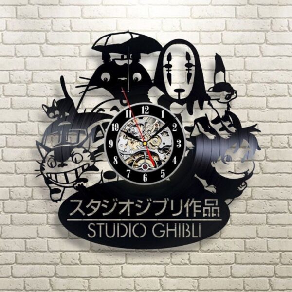 Totoro Studio Ghibli Clock 7 Wall clock designed with Studio Ghibli character silhouettes against a white brick wall.