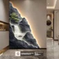 Wall art with illuminated waterfall and boat scene, set in a modern interior with marble floor and decorative elements.
