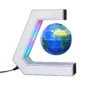 A small globe levitates within a C-shaped magnetic stand that has built-in LED lights and an attached power cord.