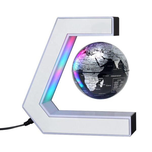 A small globe floats and spins inside a C-shaped magnetic levitation stand with built-in LED lights.